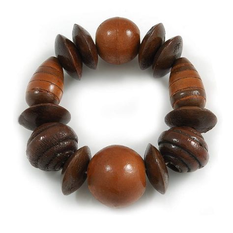 PRICES MAY VARY. Style: boho Occasion: beach holiday, casual wear, cocktail party Material: wood Type: chunky, stretchy Collection: wooden Give your look a chic boho quality with this geometric wooden bracelet in hues of brown. The bracelet made of various shape and size wooden beads put together on elasticated thread. The bracelet has a stretch design to fit comfortably around most wrist sizes. Will fit up to 19cm length. The largest bead is about 25mm in diameter. Wood Bead Bracelet, Wooden Bracelet, Chunky Bracelets, Beach Holiday, Wood Jewellery, Style Boho, Material Wood, Types Of Wood, Wooden Beads