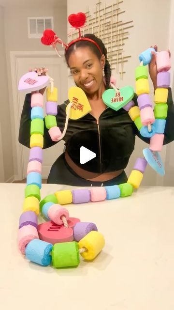 Waverly on Instagram: "Another trip down memory lane of one of my fave #giantcandy #diy , I made a giant #candynecklace ! Super simple and cute diy can be used as #partyprops or  #photoshootprops ! #candyhearts #candyland #giantfood #dopaminedecor #candybracelet #artsandcrafts #dollartreediy #easydiy" Candyland Props Diy, Candyland Cubicle Decorations, Giant Lollipop Decorations Diy, Diy Candy Land Decorations, Candyland Trunk Or Treat Ideas, Candyland Game Pieces, Candyland Float, Diy Giant Candy Props, Candyland Diy