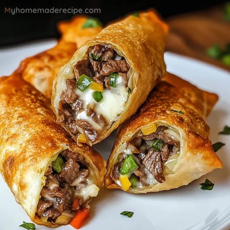 Crispy Philly Cheesesteak Egg Rolls Recipe - My Home Made Recipe Philly Steak And Cheese Egg Rolls, Philly Cheese Steak Egg Roll Recipes, Philly Cheese Steak Rolls Recipe, Philly Cheese Steak Egg Rolls Ground Beef, Philly Cheesesteak Burrito, Steak Cheese Egg Rolls, Cheesesteak Egg Rolls Recipe, Philly Cheesesteak Roll Ups, Air Fryer Philly Cheesesteak Egg Rolls