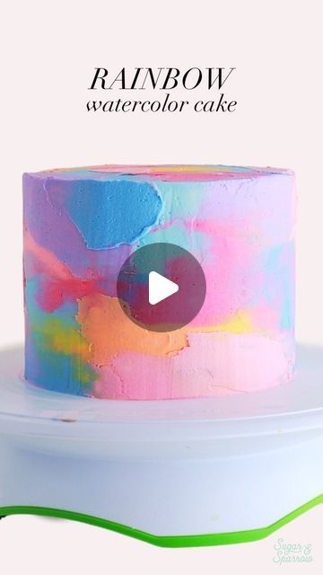 Multi Colored Cake Frosting, Watercolor Frosting Technique, Rainbow Frosting Birthday Cake, Coles Rainbow Cake Hack, Arts And Crafts Cake Ideas, Rainbow Cake Icing, Rainbow Cake Frosting, Rainbow Watercolor Cake, Rainbow Frosted Cake