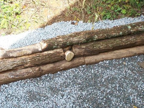 log retaining wall | Burial | Pinterest | The o'jays, Garages and ... Log Retaining Wall, Small Garden Wall Ideas, Cheap Retaining Wall, Wooden Retaining Wall, Front Door Landscaping, River Garden, Landscaping On A Hill, Garden Retaining Wall, Tree Logs