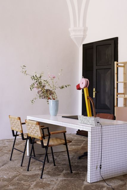 Villa Lena Reception Quaderna table by Superstudio for Zanotta. Tahiti lamp by Ettore Sottsass. Photo © Coke Bartrina Memphis Milano Design, Villa Lena, Italian Furniture Design, Tile Furniture, Tile Table, Italian Interior Design, Italian Interior, Memphis Design, Modern Restaurant