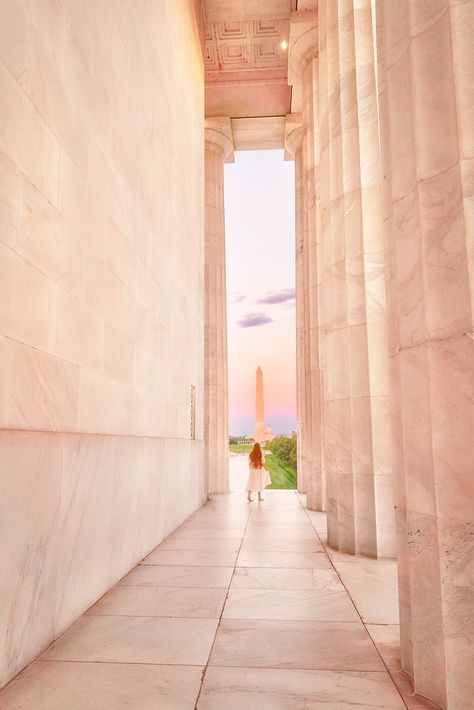 Looking down the corridor of the Lincoln Memorial. At the end of the corridor there is a woman wearing a white dress with long hair standing facing the Washington Monument in the distance. Things To Do In Washington, Ultimate Bucket List, Lincoln Memorial, Washington Monument, Washington Dc, Lincoln, Monument, Long Hair, Bucket List