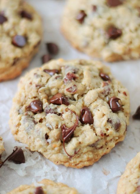 Soft and chewy cookies with loads of chocolate chips, chopped pecans, oats, and coconut. These jumbo-sized cowboy cookies are the BEST! Best Cowboy Cookies, Cowboy Cookie, Copycat Cookies, Crumbl Copycat, Cowboy Cookie Recipe, Ginger Snaps Recipe, Coconut Cookies Recipes, Coconut Chocolate Chip Cookies, Cowboy Cookies