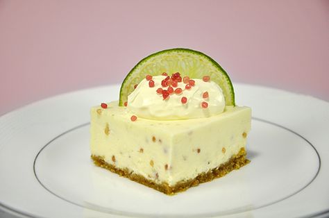 This recipe is decadent and refreshing with the richness of white chocolate and the Fresh Burst of the finger lime caviar suspended throughout the cheesecake. The finger lime bursts in your … Lime Cheesecake Recipes, Gf Biscuits, Lime Dessert Recipes, Party Food Favorites, Lime Dessert, Finger Limes, Delish Cakes, Caviar Lime, Lime Desserts