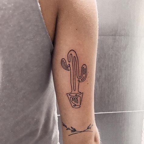 One Line Tattoos | POPSUGAR Beauty UK Single Line Cactus Tattoo, Cactus Tree Tattoo, One Line Cactus Tattoo, Small Cactus Tattoo Simple, Line Cactus Tattoo, Fine Line Cactus Tattoo, Continuous Line Tattoos, Continuous Line Tattoo, Geometric Line Tattoo