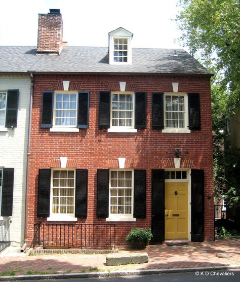 Old Town Alexandria Brick House with Yellow Door | Flickr - Photo Sharing! Front Door Brick House, Brick House Trim, Yellow Brick Houses, Yellow Front Door, Yellow Front Doors, Black Shutters, Orange Brick, House Shutters, Yellow Door