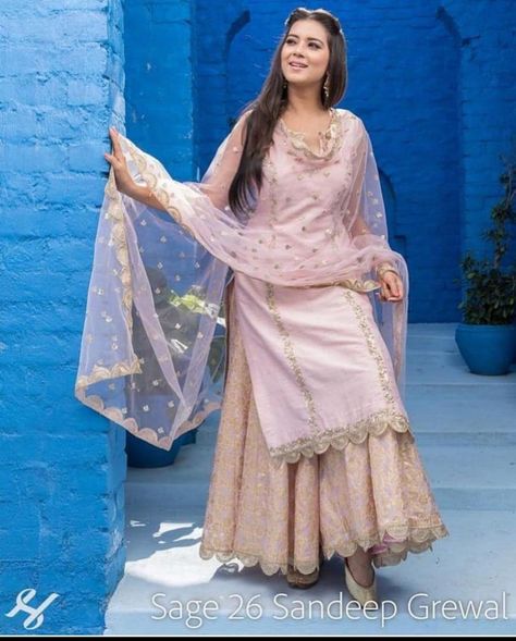 Get the look now. . . . #trendalertstore #sharara #shararasuit #shararadesign #pakistanisuits #ritukumar #weddingdress… Sarara Dress, Suit With Skirt, Sharara Designs, Punjabi Outfits, Indian Designer Suits, Salwar Kamiz, Indian Gowns, Embroidery Suits Design, Designer Party Wear Dresses