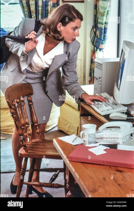 Download this stock image: 1990’s woman computer working at home retro vintage, young mother on the move 28-32 years with computer tower screen keyboard & mouse, landline telephone, business notes on paper pad. Light airy office living room home/business environment . 1990’s fashion, style, technology, mode, lifestyle - 2GXK5M6 from Alamy's library of millions of high resolution stock photos, illustrations and vectors. 1990s Office Fashion, 90s Office Core, 90s Office Aesthetic, 90s Office Fashion, Airy Office, Corporate Core, 90s Office, Aa Quotes, Woman Office