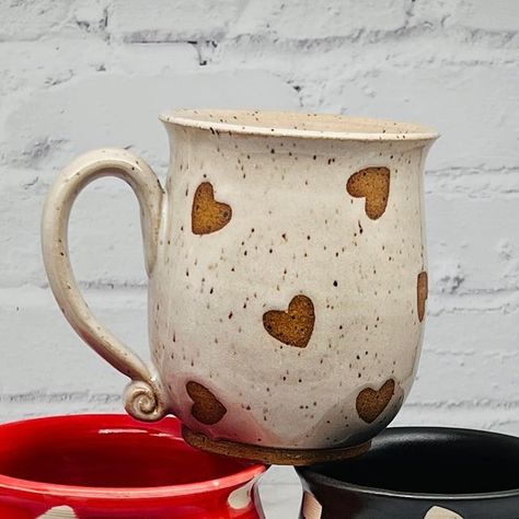 Paula Clegg on Instagram: "Check out these cute heart mugs I just unloaded from the kiln! Which color is your favorite?! These will be available in my February Restock. (Date is still TBD) #pottery #valentinesdaygift" Valentines Day Ceramics Ideas, Valentines Pottery Ideas, Valentine Pottery Ideas, Valentines Ceramics, Valentines Day Pottery, Valentines Pottery, Valentine Pottery, Potters Hands, Glaze Techniques