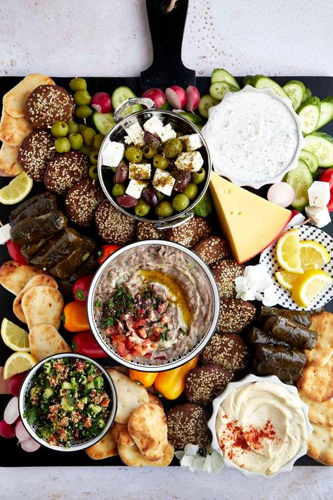 Learn how to make an easy Mediterranean Mezze Platter for a healthy appetizer or main course perfect for feeding a crowd! Mezze Table, Mediterranean Board, Italian Platter, Mediterranean Mezze, Tapas Platter, Roasted Eggplant Salad, Apartment Recipes, Vegetarian Entree, Dessert Boards