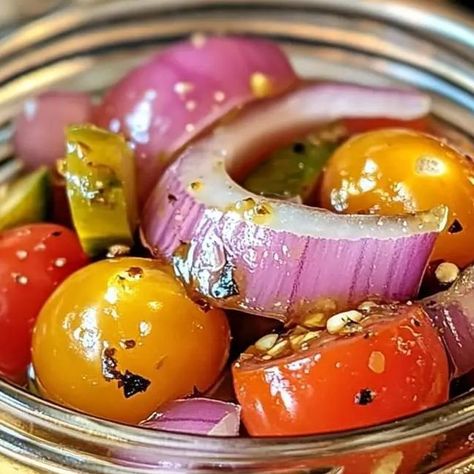 Chef zouheir on Instagram: "Pickled Cherry Tomatoes, Red Onions, and Cucumbers

Ingredients:

- 1 pint cherry tomatoes
- 1/2 red onion, thinly sliced
- 1/2 cucumber, thinly sliced
- 1 cup white vinegar
- 1/2 cup water
- 1/4 cup sugar
- 1 teaspoon salt
- 1/2 teaspoon dried oregano
- 1/4 teaspoon red pepper flakes
- 1/4 cup fresh dill, chopped

Instructions:

1. Prepare the vegetables: Wash and dry the cherry tomatoes, red onion, and cucumber. Thinly slice the red onion and cucumber.
2. Make the pickling liquid: In a small saucepan, combine the white vinegar, water, sugar, salt, oregano, and red pepper flakes. Bring to a boil over medium heat, stirring until the sugar and salt dissolve.
3. Pour the pickling liquid over the vegetables: Place the cherry tomatoes, red onion, and cucumber in a j Pickling Veggies, Pickled Cherry Tomatoes, Apple Cinnamon Recipes, Pickled Cherries, Keto Salads, Cinnamon Recipes, Pickled Veggies, Pickled Vegetables, Red Onions