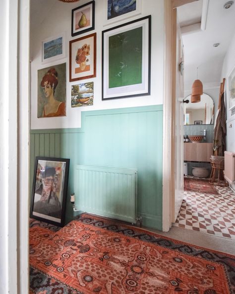 Ad - HALLWAY IN STILLS - I can’t believe I’ve not put any images up of this space yet. Transforming my small hallway into a cosy, inviting space has been all about clever design choices! 🪴✨ I added panelling to bring in some character and colour, painted a feature around the window for that unique touch and layered in gorgeous rugs from @ruggable for warmth and style. Both rugs were designed by Justina Blakeney and they are a work of art in themselves. The finishing touches are paintings and ... Hallway Painting, Cottage Hallway, Hallway Panelling, Hallway Paint, Justina Blakeney, Small Hallway, Small Hallways, Clever Design, The Window