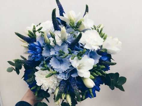 Blue and white bouquet with a hint of deep purple. Blue hydrangea bachelor's button white freesia carnations and purple veronica. #weddingbouquet #wedding #bouquet #carnations Deep Blue Flowers Bouquets, Blue Carnations Bouquet, White And Blue Prom Bouquet, Purple Veronica, Prom Bouquet Ideas, Blue And White Bouquet, Purple Boutonniere, Flower Bouquet Painting, White Freesia