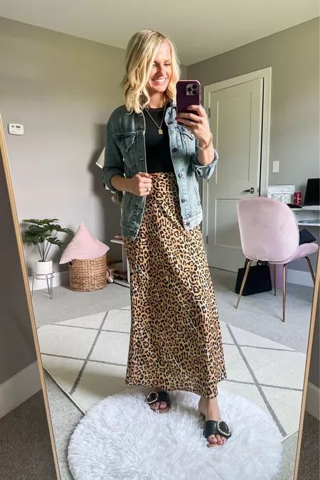 I love styling my leopard silk skirt with a denim jacket! This leopard skirt outfit is a great affordable fashion option for a fun fall outfit. How To Style Leopard Print Skirt, Satin Leopard Skirt Outfit, Leopard Skirt Outfit 2024, Leopard Print Maxi Skirt Outfit, Leopard Skirt Outfit Fall, Leopard Maxi Skirt Outfit, Slip Skirt Outfit Fall, Leopard Print Skirt Outfit, Slip Skirt Outfit