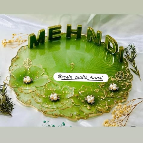 Bringing a touch of tradition to modern art ✨🌼 Our resin Haldi Mehndi palette captures the vibrant essence of celebration and culture. Perfect for adding a splash of color to your special moments! 💛💚 Dm for order 🎁🎁 #haldimehndi #resinart #culturalvibes #haldiceremony #mehndi #smallbusiness #wedding #indianwedding #bride #groom Resin Haldi Platter, Wedding Resin Art, Resin Engagement Ring, Cute Clay Art Ideas, Resin Art Business, Sangeet Theme, Mehndi Decorations, Cute Clay Art, Fairy Jewellery