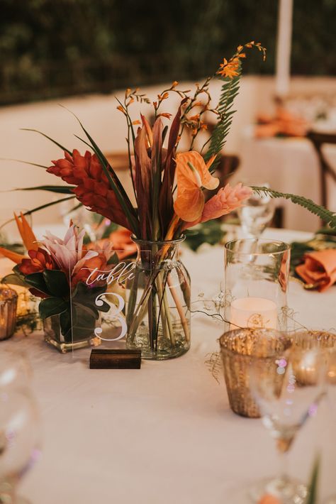 Tropical Boho Tablescape, Beach Floral Arrangements Wedding, Rust Tropical Wedding, Tropical Floral Table Arrangements, Tropical Terracotta Wedding, Spring Tropical Wedding, Boho Tropical Centerpieces Wedding, Fall Beach Wedding Centerpieces, Terracotta Tropical Wedding