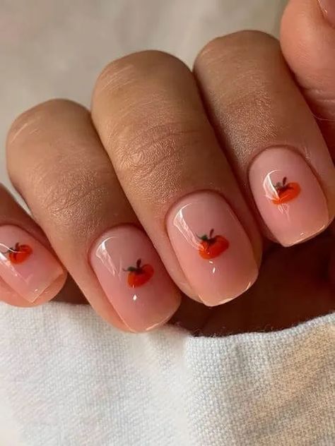 Get into the fall and Halloween spirit with our unique pumpkin nails. Perfect for adding a seasoned flair and spooky touch to your nail designs! Nails Navidad, Easy Fall Nail Designs, Pumpkin Nail Designs, Nails Thanksgiving, Autumn Manicure, Kutek Disney, Simple Fall Nails, Space Nails, Pumpkin Nails