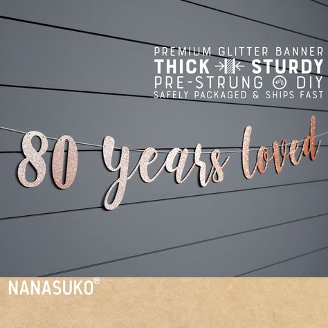 "80 years loved banner in Regular or Large size READY TO SHIP IN 1 BUSINESS DAY Information for sizes, assembly options, and color swatches can be found in the images. ✿ SHOP MATCHING ITEMS HERE ✿ https://www.etsy.com/shop/NANApartysimplified?ref=seller-platform-mcnav&search_query=80 ✿ VISIT OUR SHOP HERE ✿ https://www.etsy.com/shop/NANApartysimplified ✿ MORE DETAILS ✿ An elegant and classy way to decorate your event. Our premium thick and sturdy REAL glitter paperboard banner comes pre-strung o 80th Birthday Banner, 70th Birthday Banner, 60th Birthday Ideas For Mom, 60th Birthday Banner, Rose Gold Banner, 80th Birthday Party Decorations, 40th Birthday Banner, 80th Birthday Decorations, Gold Glitter Party