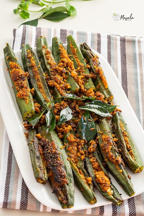 Stuffed Okra Recipe - Stuffed Bhindi Fry | Bharwa Bhindi - Masalakorb Bharwa Bhindi, Stuffed Okra, Bhindi Fry, Okra Recipe, Okra Recipes, Coconut Ginger, Dried Mangoes, Food Words, Indian Cooking