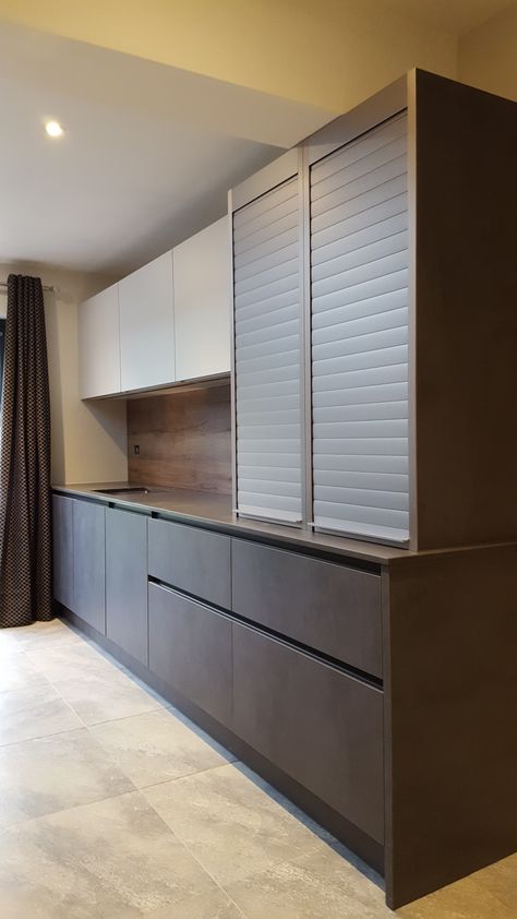 Roller shutter tambour units from Leicht. Contact Hubble Kitchens your Sussex and Surrey dealer. Wardrobe In Kitchen, Shutter Kitchen Cabinets, Kitchen Roller Shutter Cabinet, Roller Shutter In Kitchen, Kitchen With Shutters, Service Platform Design Kitchen, Kitchen Shutter Cabinets, Kitchen Shutter Design, Rolling Shutter Kitchen