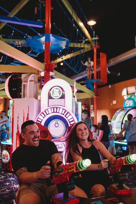 This couple wanted some fun and unique couples photos for their anniversary. So we headed to an arcade so they could have fun and play some games! The carnival lights made for such a cool atmosphere! Arcade Games Photoshoot, Video Game Engagement Photos, Carnival Pics With Boyfriend, Arcade Prewedding, Arcade Couples Photoshoot, Arcade Wedding Photos, Unique Prenup Photoshoot Ideas, Couples Arcade, Arcade Couple Pictures