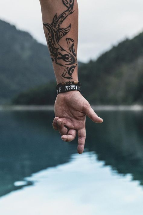 Picture of detailed vegan tattoo on forearm with beautiful lakes and mountains in the background. Shark Tattoo Meaning, Unique Wrist Tattoos, Vegan Tattoo, Wrist Tattoos For Guys, Inspiration Tattoo, Shark Tattoos, Cool Small Tattoos, Tattoo Aftercare, Hand Tattoos For Guys