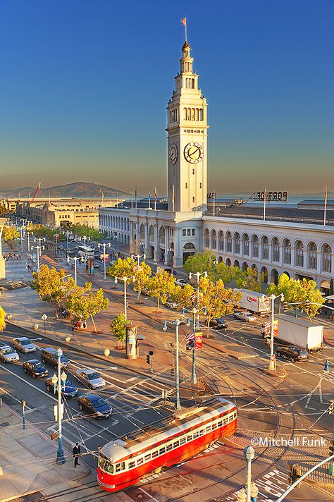 Orange Street Car And Ferry Building On Embarcadero, San Francisco By Mitchell Funk   www.mitchellfunk.com California Street San Francisco, San Francisco Suburbs, Coit Tower San Francisco, Embarcadero San Francisco, San Francisco Pictures, San Francisco Streets, West Coast Travel, Sao Francisco, San Francisco Ferry Building