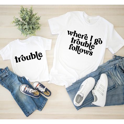 Mommy and Me outfits. WHERE I GO TROUBLE FOLLOWS TROUBLE Choose t-shirt colors from the chart in the pictures. Type the shirt color in the PERSONALIZATION BOX. Choices: white, athletic grey, deep grey, dark grey, peach, mauve, pink, ice blue, columbia blue, black, stone, olive, natural. ADULT tees: Bella Canvas Unisex T-shirt 4.2 oz., 100% Airlume combed and ring-spun Cotton. available in sizes XS-3XL BABY bodysuits: short sleeved and 100% combed and ring spun cotton, OR 50% polyester, 25% cotto Mommy And Me Cricut Projects, Mother Daughter Shirts Ideas Funny, Mommy And Me Cricut Shirts, Mother Daughter Trip Shirts, Kids Vinyl Shirt Ideas, Mommy And Me Tshirts, Girl Mom Shirts, Mama And Me Shirts, Mom And Me Outfits