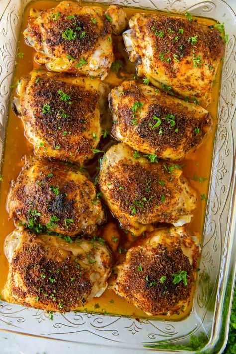 The BEST Oven Baked Chicken Thighs! This easy recipe makes juicy, flavorful bone in skin on chicken thighs with crispy skin. Or use boneless skinless chicken thighs. One of our favorite chicken dinner recipes! Easy Oven Chicken Thigh Recipes, Hi Jen Thigh Recipes, Bone In Skin On Thigh Recipes, Chicken Thigh Baked Bone In, Bone In Skin On Chicken Thigh Recipes Crock Pot, Chicken Thigh Filets In Oven, Bine In Chicken Thigh Recipes, Chicken To Feed A Crowd, Easy Bone In Skin On Chicken Thigh Recipes