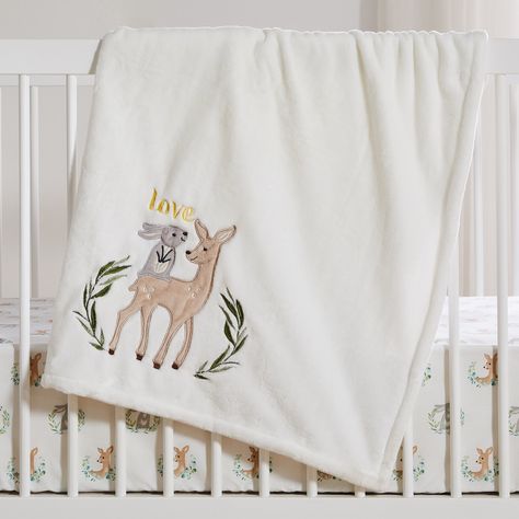 Wrap your baby up in warmth and comfort with the Levtex Baby Woodland Pals Blanket. Made of an adorable soft grey plush fabric , this blanket features an appliqued and embroidered bunny on a deer's back surrounded by green leaves on a cream plush, and the word LOVE embroidered above This plush blanket measures 30 x 40in. and is machine washable for easy maintenance. LEVTEX BABY WOODLAND PALS : A beautiful accessory for any baby nursery, the Woodland Pals plush blanket features an appliqued and e Deer Nursery, Embroidered Bunny, Green Nursery, Woodland Friends, Nursery Accessories, Taupe Grey, Woodland Scene, Stroller Blanket, The Word Love