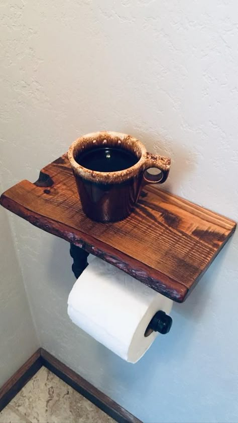 Gorgeous Western Larch live edge wood with steel pipe in rubbed bronze color. This wood was hand harvested, milled and crafted on our NW Montana Ranch. I absolutely love this toilet paper holder! It is perfect for any beverage, phone etc. Stained with Minwax Special Walnut color, however we can Rustic Wood Toilet Paper Holder, Rustic Bathroom Toilet Paper Holder, Things To Do With Live Edge Wood, Small Bathroom Western Ideas, Live Edge Countertop Bathroom, Western Home Decor Diy, Woodsy Bathroom, Western Home Ideas, Western Rustic Home Decor