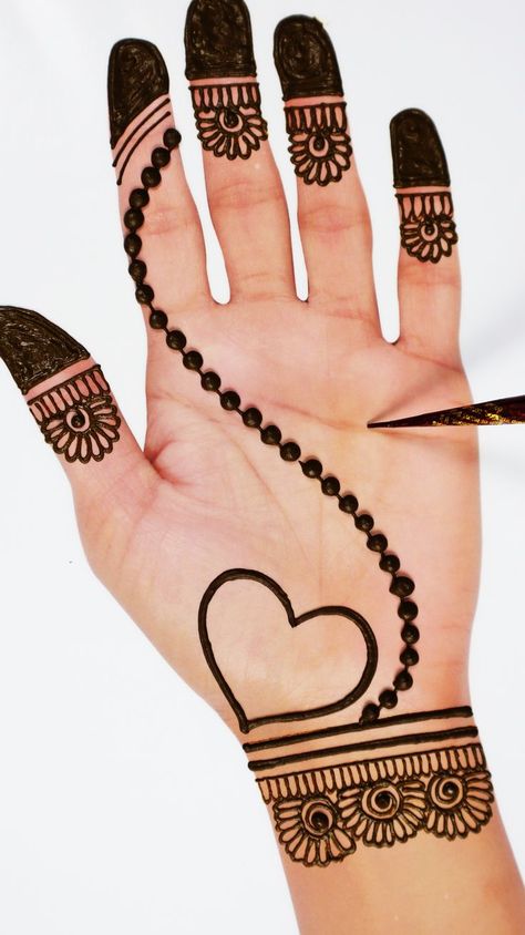 Very beautiful heart shape easy mehndi design for karwachauth. New latest heart mehndi design for front hands. #fronthandmehndi #karwachauth #mehndidesign #mehndi #arabicmehndi #heartmehndi Mehandi Designs For Hands Easy, Heart Mehndi Designs Simple, Mehndi Designs Simple For Kids, Simple And Easy Mehndi Designs For Front Hand, Mehandi Designs Easy Simple, Easy Mehandi Designs For Hands, Front Hand Mehndi Designs Simple Easy, Very Easy Mehendi Designs, Mehndi Easy Design