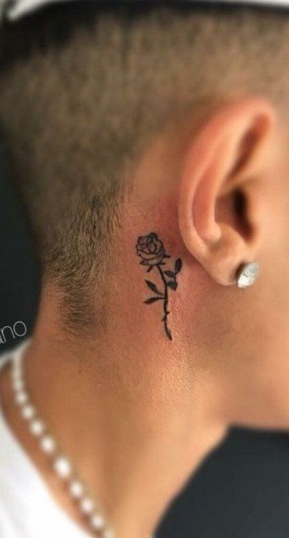 Small tattoos for men are becoming increasingly popular. One of the most popular places to get a small tattoo for men is behind the ear. This location is perfect for many reasons. First, it is easily hidden if you need to, but it is also easily shown off when you want to. Rose Tattoo Behind Ear, Rose Neck Tattoo, Herren Hand Tattoos, Tree Tattoo Arm, Small Neck Tattoos, Behind Ear Tattoos, Tattoo Tree, Rose Tattoos For Men, Men Tattoo