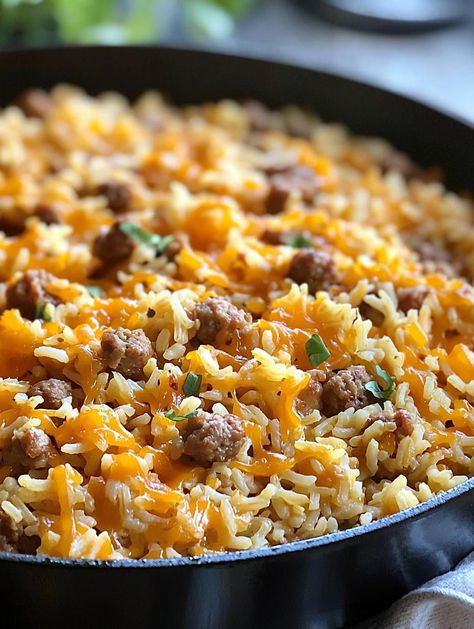 Cheesy Sausage and Rice Smoked Sausage And Rice Casserole, Rice And Sausage Recipes, Sausage And Rice Recipes, Cheesy Sausage And Rice, Sausage Rice Skillet, Sausage Rice Casserole, Cooked Rice Recipes, Sausage And Rice Casserole, Bacon Rice