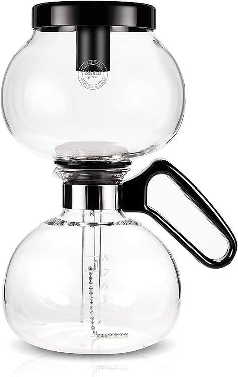 This Yama glass stovetop Coffee Syphon is a unique kind of brewer. Akin to something in a scientific laboratory, the Vacuum style brewer is as much a conversation piece as it is a quality Coffee brewer. The Yama glass siphon brewer ships with one filter cloth, the filter assembly, a measuring spoon, the lid/stand, and the brewer itself. The 8 cup size specification refers to the Yama cup size, which measures to about 3-4 ounces per cup. Warning: use extreme caution when heating with an open flam Coffee Siphon, Syphon Coffee Maker, Vacuum Coffee Maker, Syphon Coffee, Siphon Coffee, Coffee Brewing Methods, Percolator Coffee, Coffee Brewer, Espresso Maker