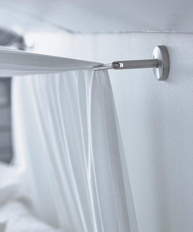 A close-up image of a curtain wire used to hang a canopy over a bed. Sloped Ceiling Bedroom, Beautiful Bed Designs, Curtain Wire, Angled Ceiling, Ceiling Curtains, Cosy Bed, Slanted Ceiling, Fall Bedding, Kids Corner