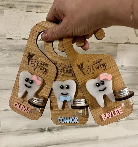 Explore creative animal puzzle designs perfect for Etsy selling featuring lasercut designs and digital drawings. Tooth Decor, Tooth Fairy Ideas, Tooth Fairy Door Hanger, Xtool Projects, Door Hanger Baby, Tooth Fairy Door, Tooth Fairy Doors, Glowforge Ideas, Fairy Ideas