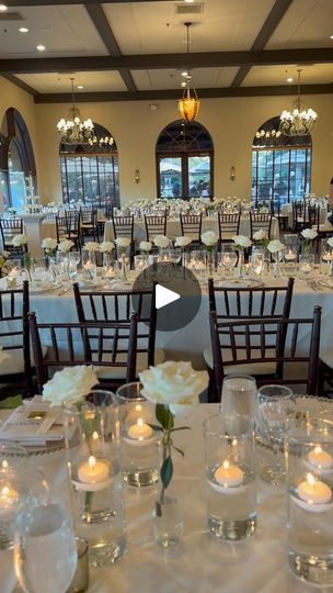 44 reactions · 3 comments | . . . . . . . . . Drumroll please! For this beautiful setup we filled over 320 pieces of glass to accomplish this look. 165 floating candles were used, and 156 single rose bud vases. To fill in these tables we did 20 of each vase on the long tables and did trios of each for the round tables making the room look spectacular once lit! 

.
.
.
.
.
.
.
.
.
#weddings #wedding #weddingreception #weddingreceptiondecor #weddinginspo #candlewedding #candles #reception #receptiondecor #ocwedding #ocweddingvenue #ocweddingflorist #talegawedding #talegagolfclubwedding #talegagolfclub #fantasyfloraldesigns #centerpieces #centerpieceideas #weddingtabledecor #weddingtablesetting | Amanda + Shealyn Heer Single Roses Centerpieces, Candles Reception, Long Tables, Rose Centerpieces, Round Tables, Single Rose, Rose Bud, Long Table, Wedding Table Settings