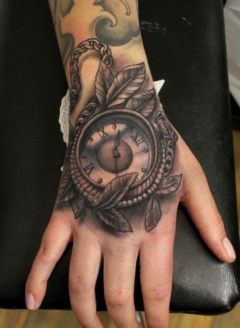 Top 75 Best Hand Tattoos for Men - Unique Design Ideas | Improb Hand Clock Tattoo, Hand Tattoos Pictures, Vintage Clock Tattoos, Herren Hand Tattoos, Skull Hand Tattoo, Watch Tattoo, Clock Tattoo Design, Wild Tattoo, Pocket Watch Tattoo