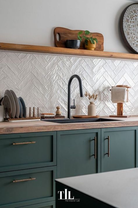 70 Eye-Catchy Herringbone Tile Backsplashes - DigsDigs Green Kitchen Cupboards, White Herringbone Tile Backsplash, Herringbone Kitchen Backsplash, Butcherblock Countertops, Kitchen Cupboard Colours, White Herringbone Tile, Herringbone Tile Backsplash, Kitchen Cupboards Paint, Transitional Decor Bathroom