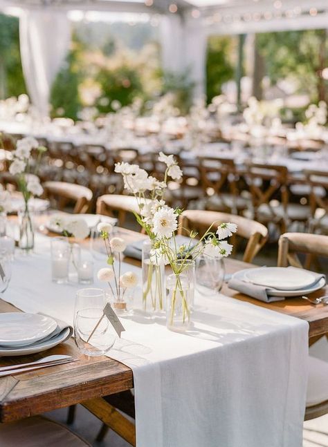 White Long Tables Wedding, White Flowers Table Setting, Butley Priory Wedding, French Backyard Wedding, Farm Table Place Setting, Bud Vase Table Setting, Bud Vases On Long Table, Green And White Bud Vases, Modern Bud Vases Wedding