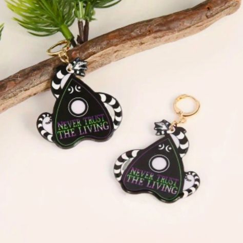 Beetlejuice 'Never Trust The Living' Dangle Earrings. Please Reference Photos For Details And Size. Make Offers, And Don't Forget To Check Out The 2, 3, Or 5 For $15 Bundle Deals In My Closet! Bundle All To Save! Beetlejuice Jewelry, Beetlejuice Earrings, Never Trust The Living, Clay Crafts Air Dry, Never Trust, Reference Photos, Beetlejuice, Earrings Color, Cute Jewelry