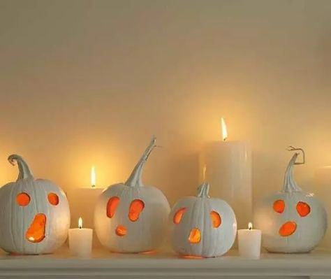 white ghost pumpkins as jack o lanterns for Halloween are a simple and cool solution that you can easily DIY Carved White Pumpkin, Halloween Chic, Halloween Fireplace, Ghost Crafts, Halloween Craft Projects, Halloween Ghost Decorations, Hallowen Ideas, Casa Halloween, Halloween Fest