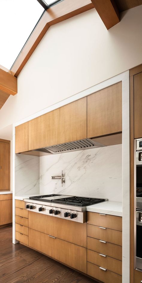 wall is flush with cabinet tops + straight line across range area; hood is paneled; simple base Green Kitchen Interior, Birch Kitchen Cabinets, Wolf Appliances, Kitchen Appliance Storage, Wall Corner, Refacing Kitchen Cabinets, Rustic Modern Kitchen, Mercer Island, Black Kitchen Cabinets