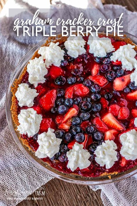 Triple berry pie is a delicious no-bake summer dessert that everyone will love! Tart, sweet, and perfectly paired with a crunchy graham cracker crust. #tripleberrypie #tripleberrypiefilling #tripleberrypierecipe #tripleberrypieeasy #berrypie #berrypiefilling #berrypierecipe #grahamcrackercrust Berry Pie Filling, Summertime Desserts, Berry Pie Recipe, Triple Berry Pie, Mixed Berry Pie, No Bake Summer Desserts, Homemade Graham Cracker Crust, Prevent Food Waste, Tiramisu Dessert