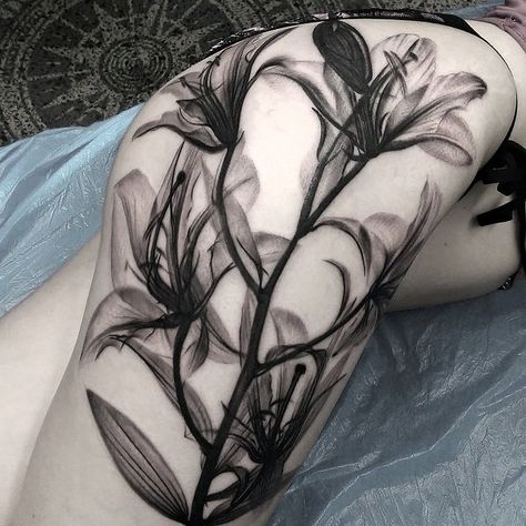 Black and white lily tattoo by Matt Jordan - 55  Awesome Lily Tattoo Designs  <3 <3 Floral Hip Tattoo, Tiger Lily Tattoos, Flower Hip Tattoos, Hip Tattoo Designs, Lillies Tattoo, Lily Tattoo Design, Lily Flower Tattoos, Plant Tattoo, Lily Tattoo