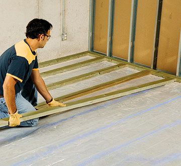 Install a wooden subfloor to help insulate flooring from cold concrete. Installing Carpet, Basement Subfloor, Concrete Floors Diy, Heated Concrete Floor, Pallet Deck Diy, Plywood Subfloor, Sheet Flooring, Basement Remodel Diy, Floor Insulation