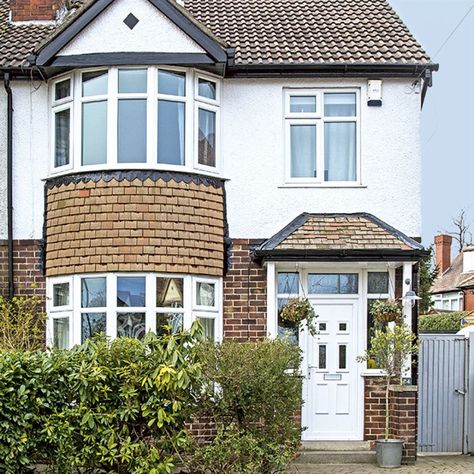 Take a peek inside this colourful family home in Leeds | Ideal Home 1930s House Exterior Uk, 1930s Porch, Door Canopy Modern, Curved Bay Window, Terraced House Interior, Rendered House, 1930s House Extension, 1930s Semi Detached House, 1930s House Exterior