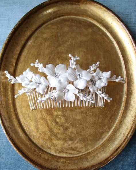 The Olivia Headpiece is a beautiful hair comb with pearlized branches, faux leather blossoms, and crystal accents, perfect for both elegant updos and flowing hairstyles on a classic or romantic bride. #EDENLUXEBridal #bridalheadpiece #bridalcomb #bridalaccessories #floralheadpiece #haircomb #bridalstyles Classic Bridal Look, Half Up Hairstyle, Bride Details, Floral Hair Comb, Romantic Luxury, Luxury Brides, Beautiful Tiaras, Floral Hair Combs, Elegant Updos